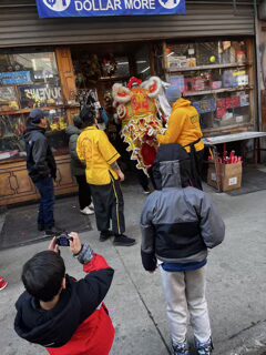 Lunar New Year celebration with lion dance in Chinatown