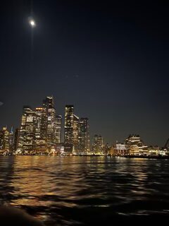 View of Manhattan skyline from sunset boat tour after a winter blizzard.
